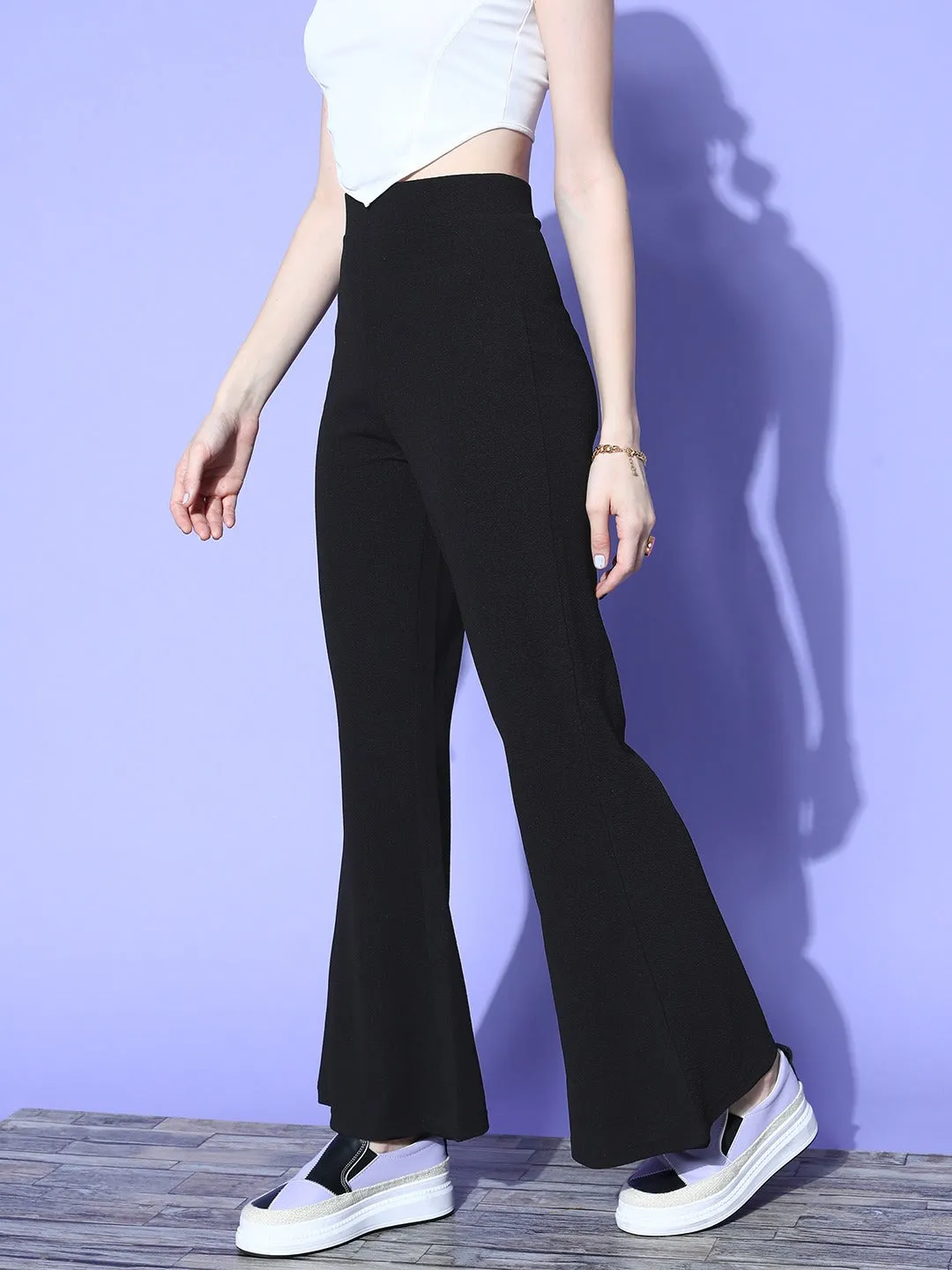 Berrylush Women Solid Black High-Rise Waist Slip-On Flared Regular Trousers